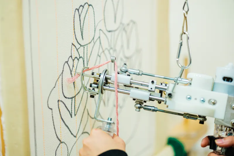 Proceso de tufting con la pistola