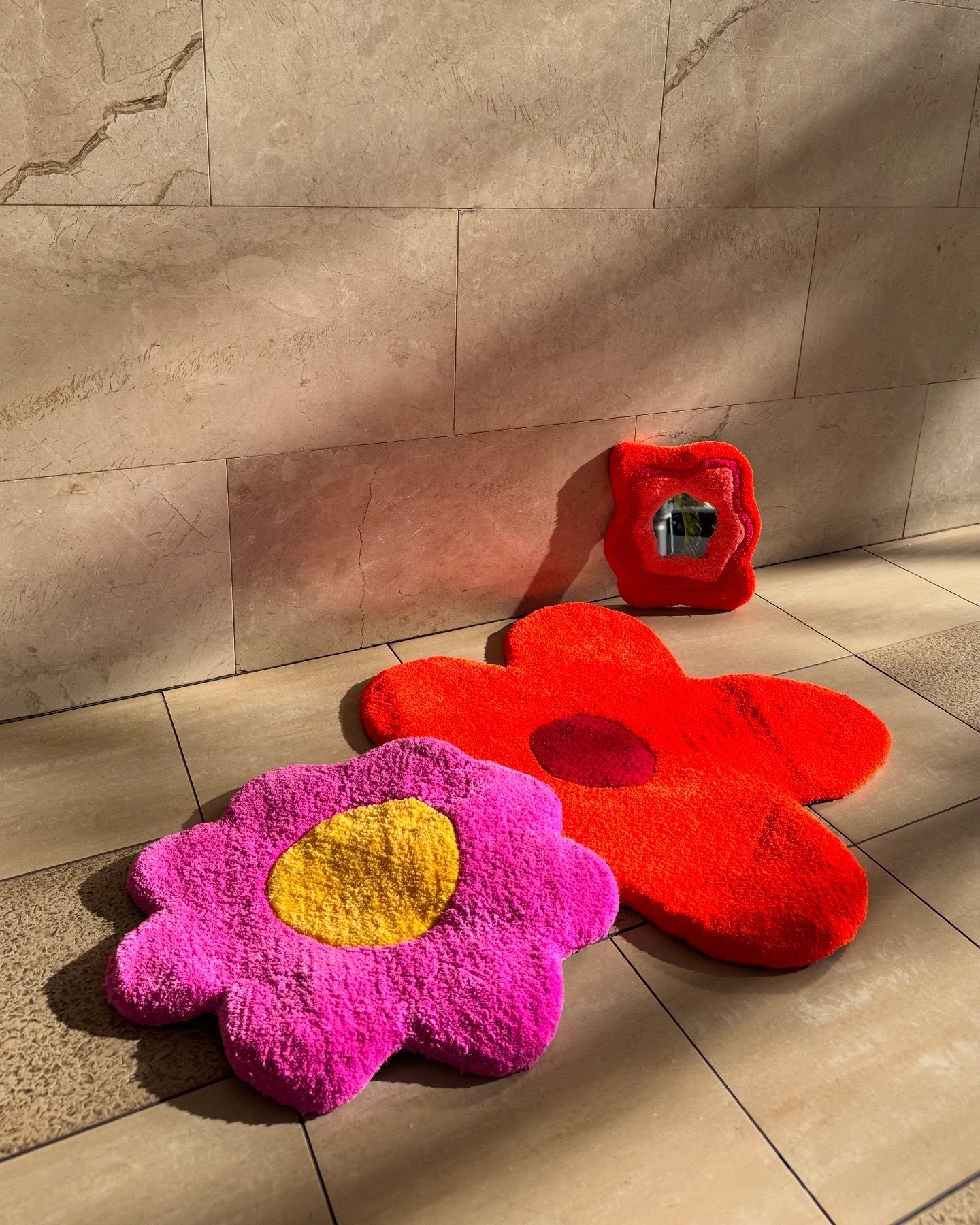 What Is Tufting? A Beginner's Guide to Rug Making in Barcelona 2 Colourful handmade tufted rugs made at a rug making class in Barcelona